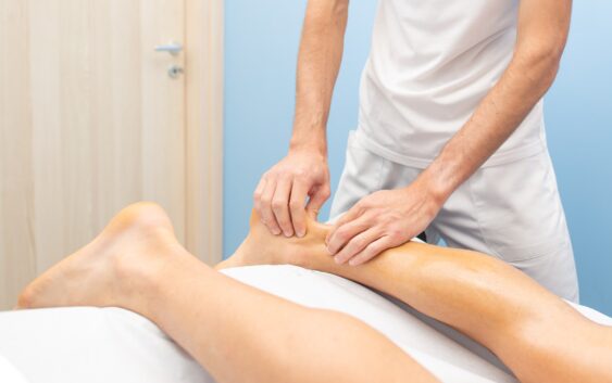 Physiotherapist during an Achilles tendon treatment